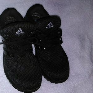 Black on Black Adidas sneakers